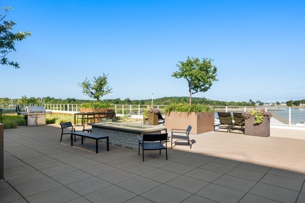10 Shipyard Drive, Unit 414 Hingham, MA 02043 - Photo 11 of 18 a view of a terrace with chairs