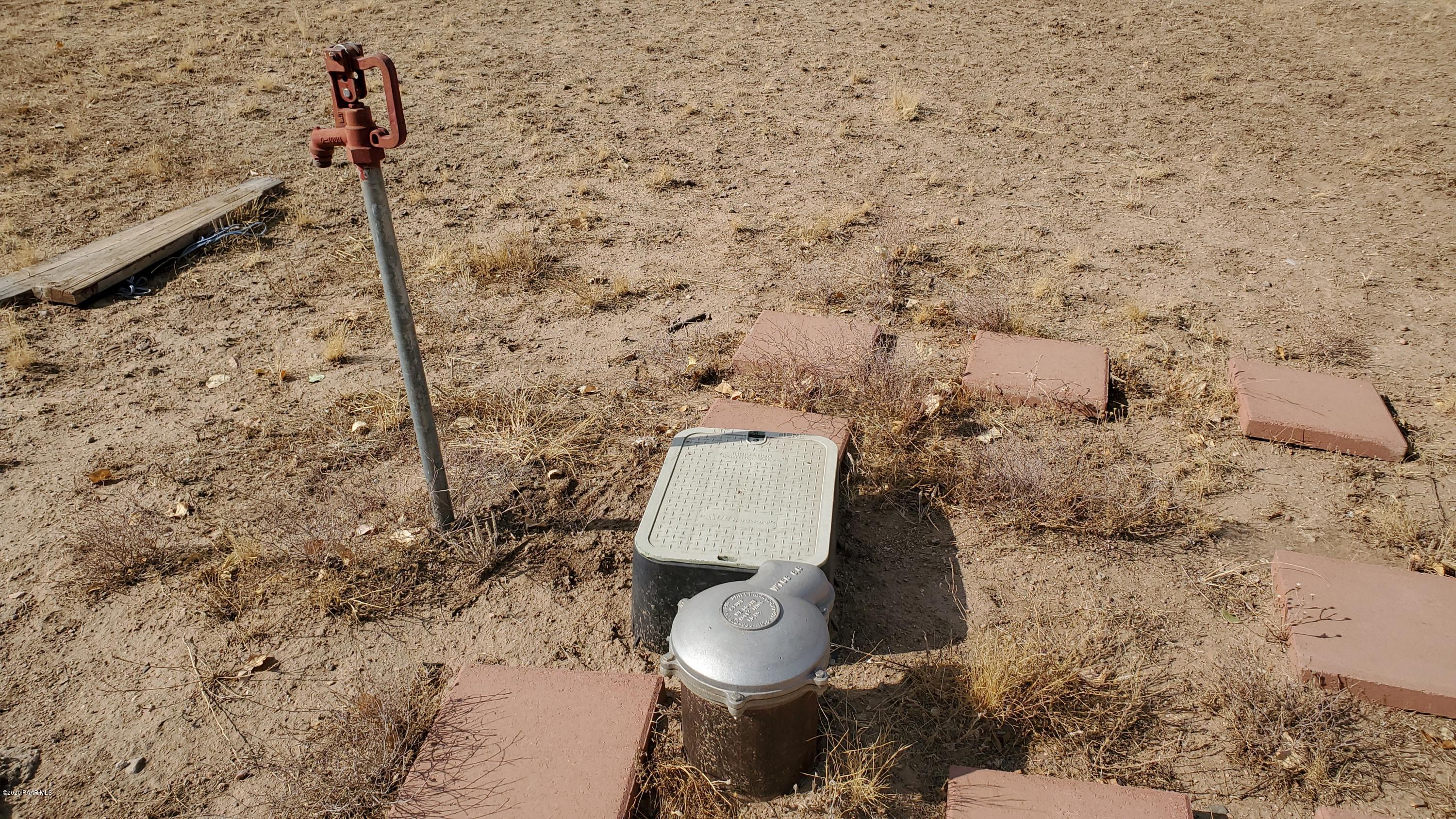 24220 North Big Springs Ranch Road Paulden, AZ 86334 - Photo 14 of 19 well head and under ground pressure tank