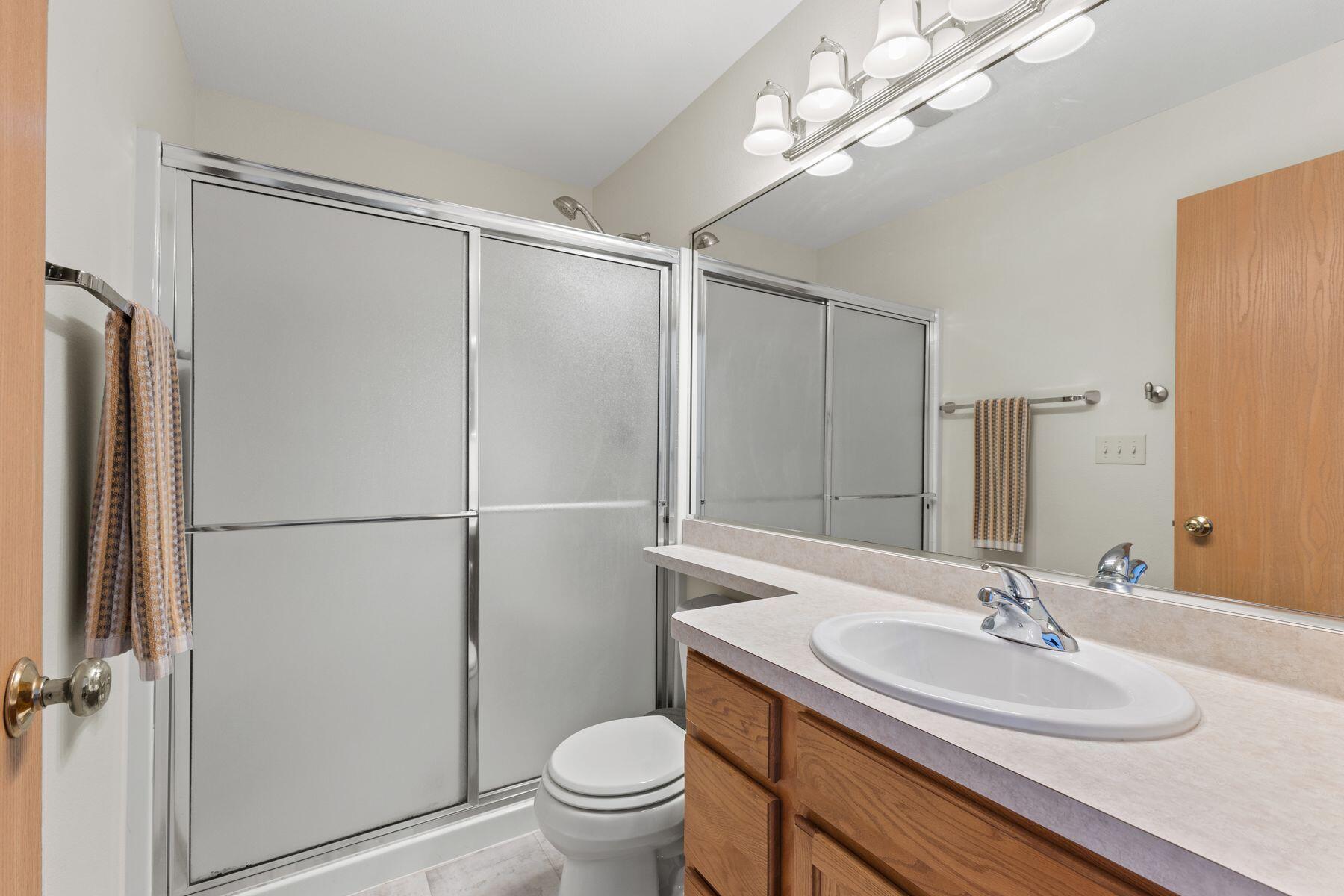 1513 92nd Street, Unit 47 Sturtevant, WI 53177 - Photo 13 of 34 First Bedroom - Ensuite Bath