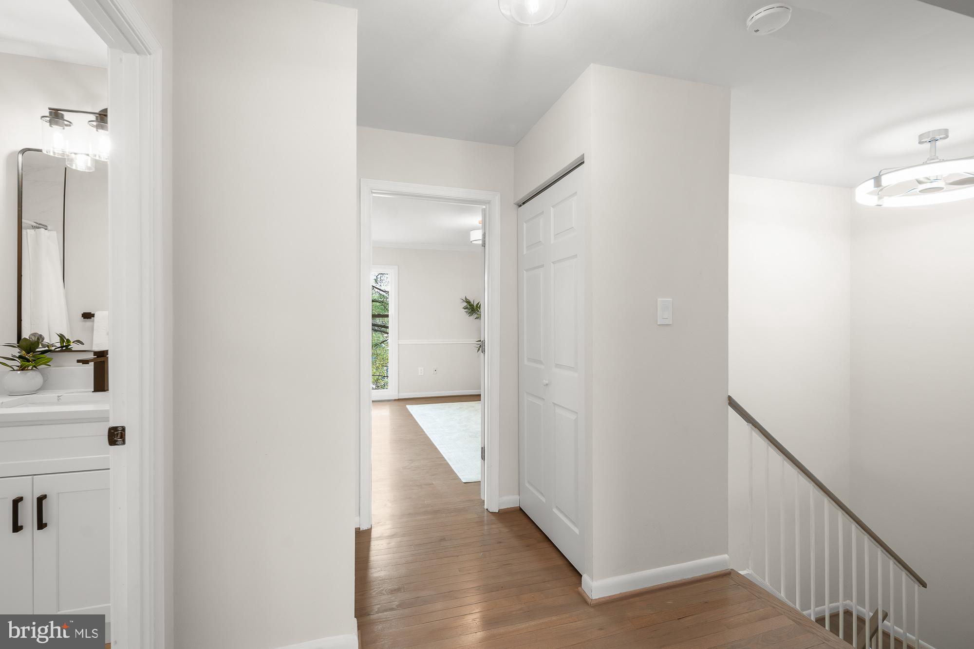 1652 Wainwright Drive Reston, VA 20190 - Photo 17 of 54 Upstairs Hallway leading into the Primary Suite