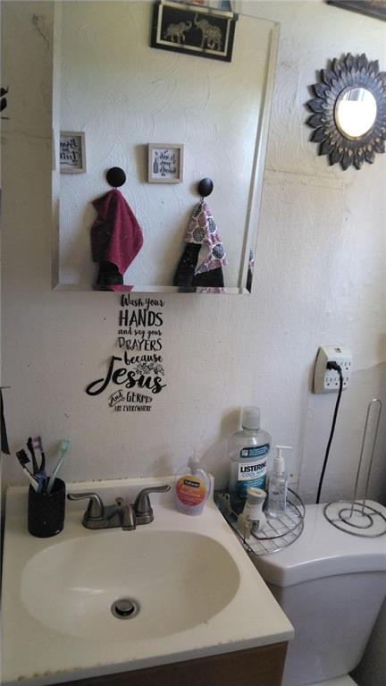 150 Stoebner Way Pittsburgh, PA 15206 - Photo 4 of 5 a bathroom with a sink and a mirror