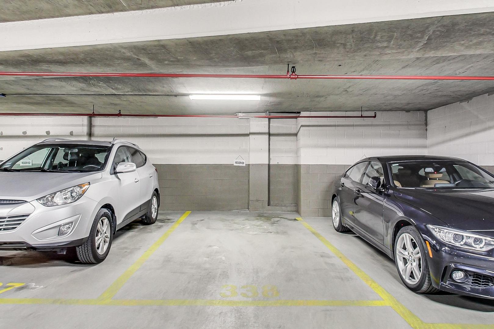 1313 North Ritchie Court, Unit 505 Chicago, IL 60610 - Photo 25 of 27 a view of parking garage with cars parked