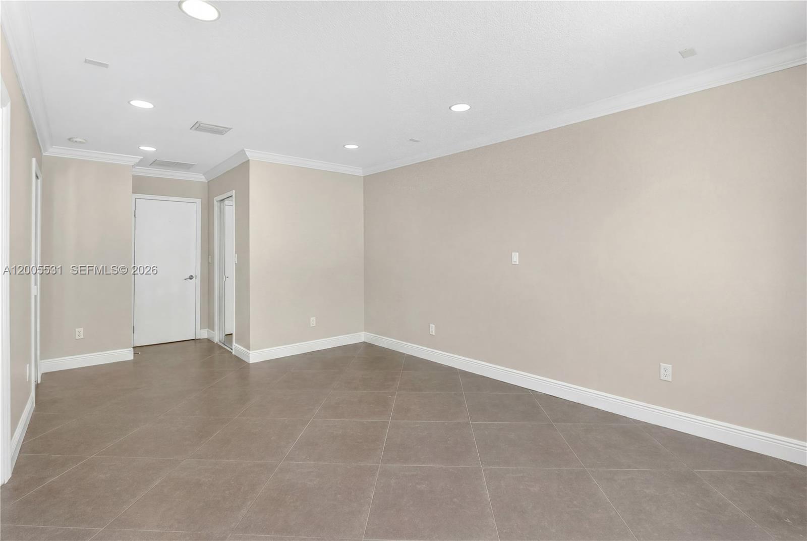 5310 Southwest 72nd Street Miami, FL 33143 - Photo 11 of 20 an empty room with an entryway