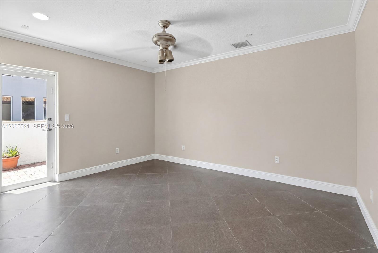 5310 Southwest 72nd Street Miami, FL 33143 - Photo 17 of 20 an empty room with a empty space and windows