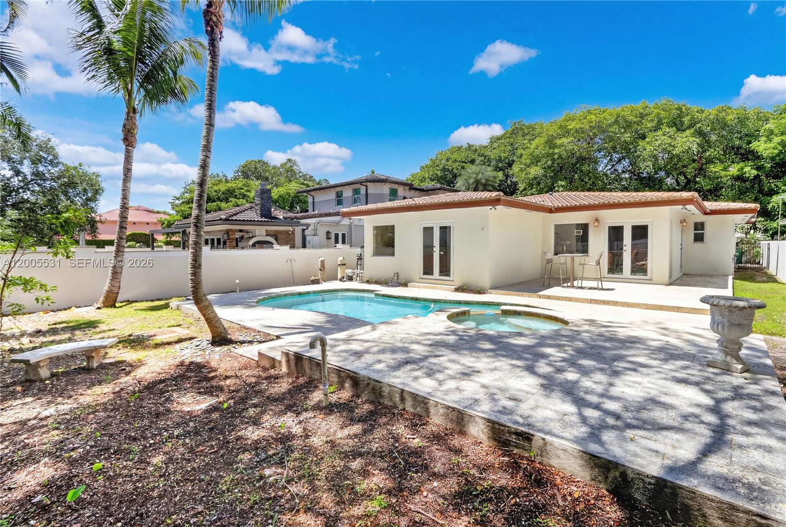 5310 Southwest 72nd Street Miami, FL 33143 - Photo 5 of 20 a view of a house with backyard and a tree