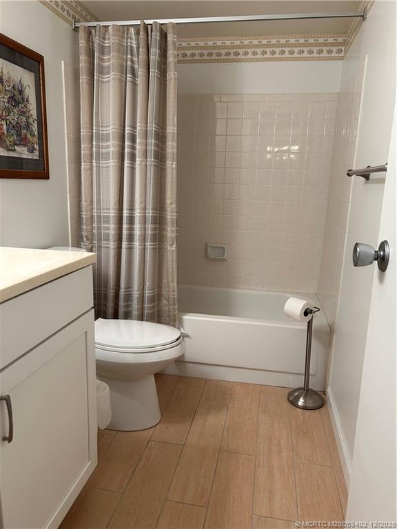 2950 Southeast Ocean Boulevard, Unit 1323 Stuart, FL 34996 - Photo 15 of 19 a bathroom with a toilet a sink and bathtub