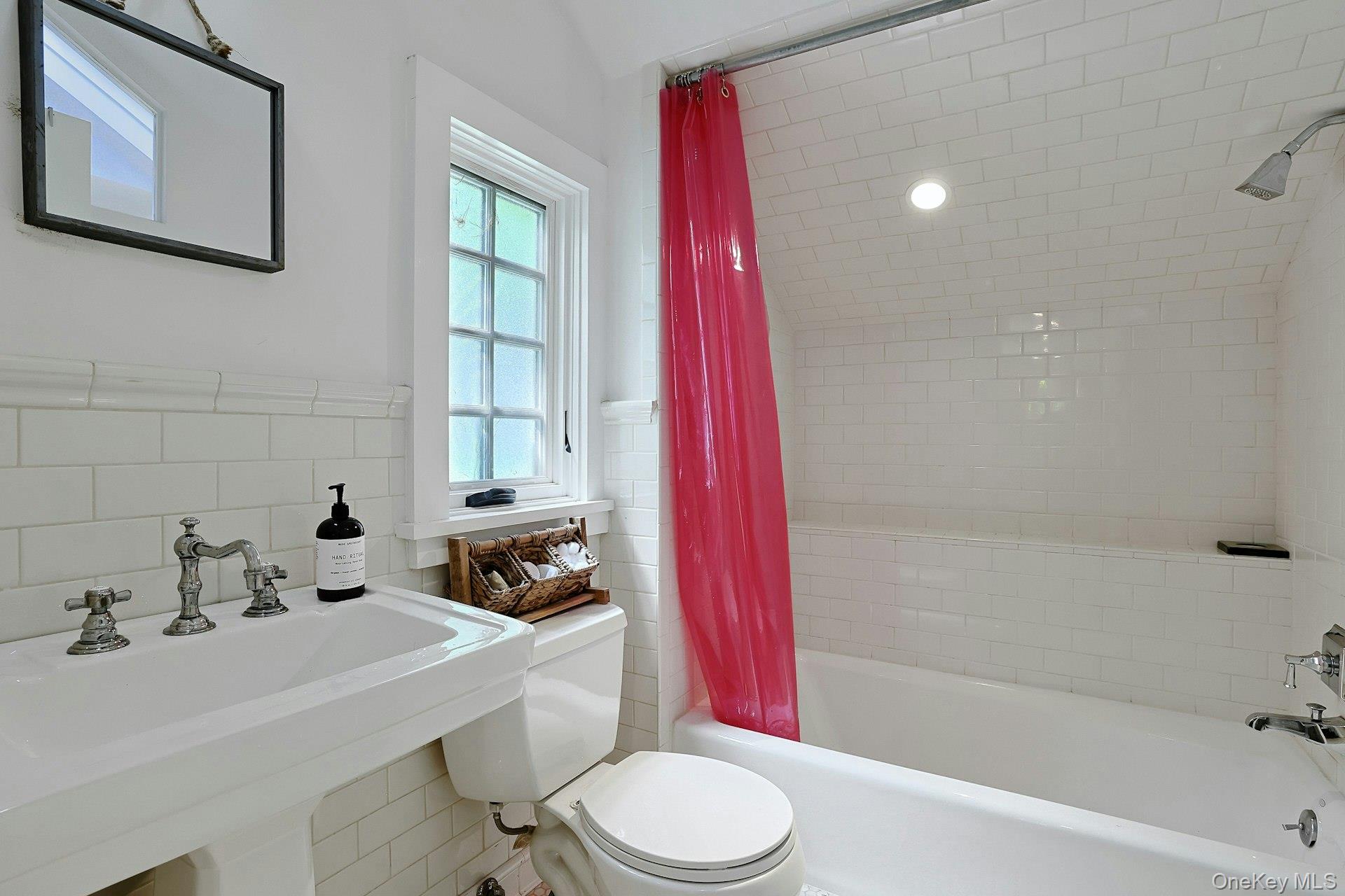 65 Douglas Road Chappaqua, NY 10514 - Photo 24 of 41 A beautifully appointed first-floor full bathroom adds comfort and convenience to the home, offering easy access for guests and everyday living.