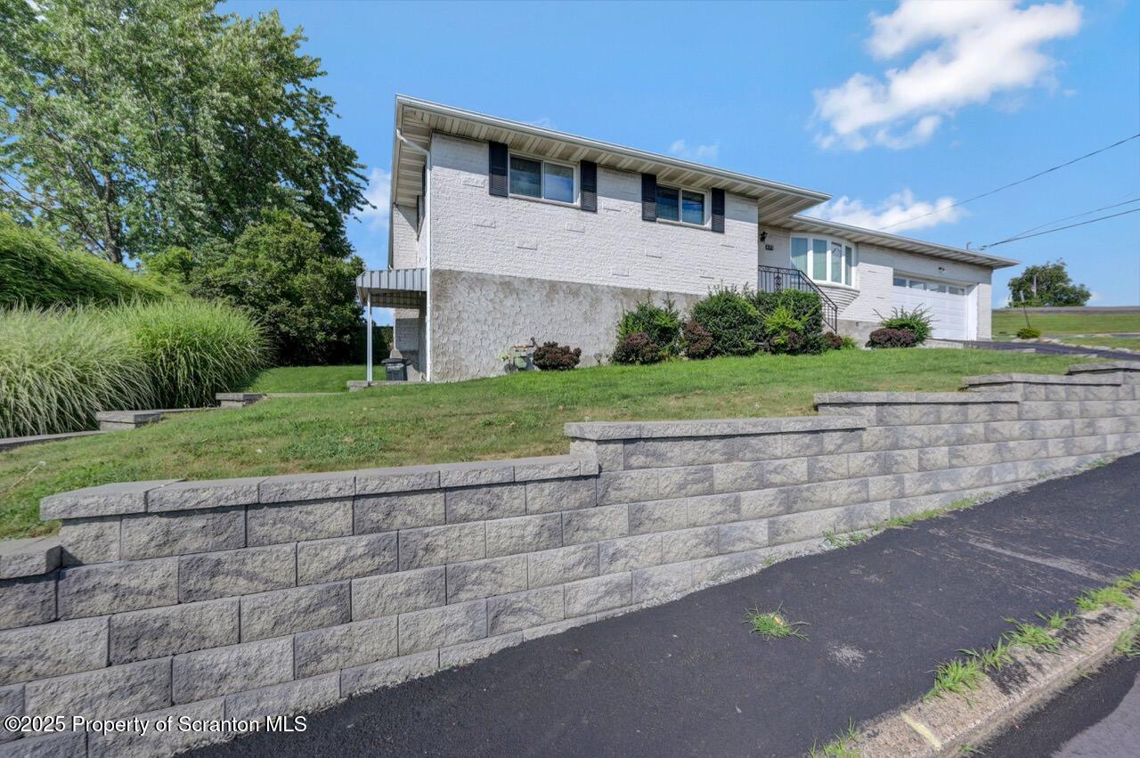 625 Cotter Street Moosic, PA 18507 - Photo 37 of 38 a front view of a house with a yard