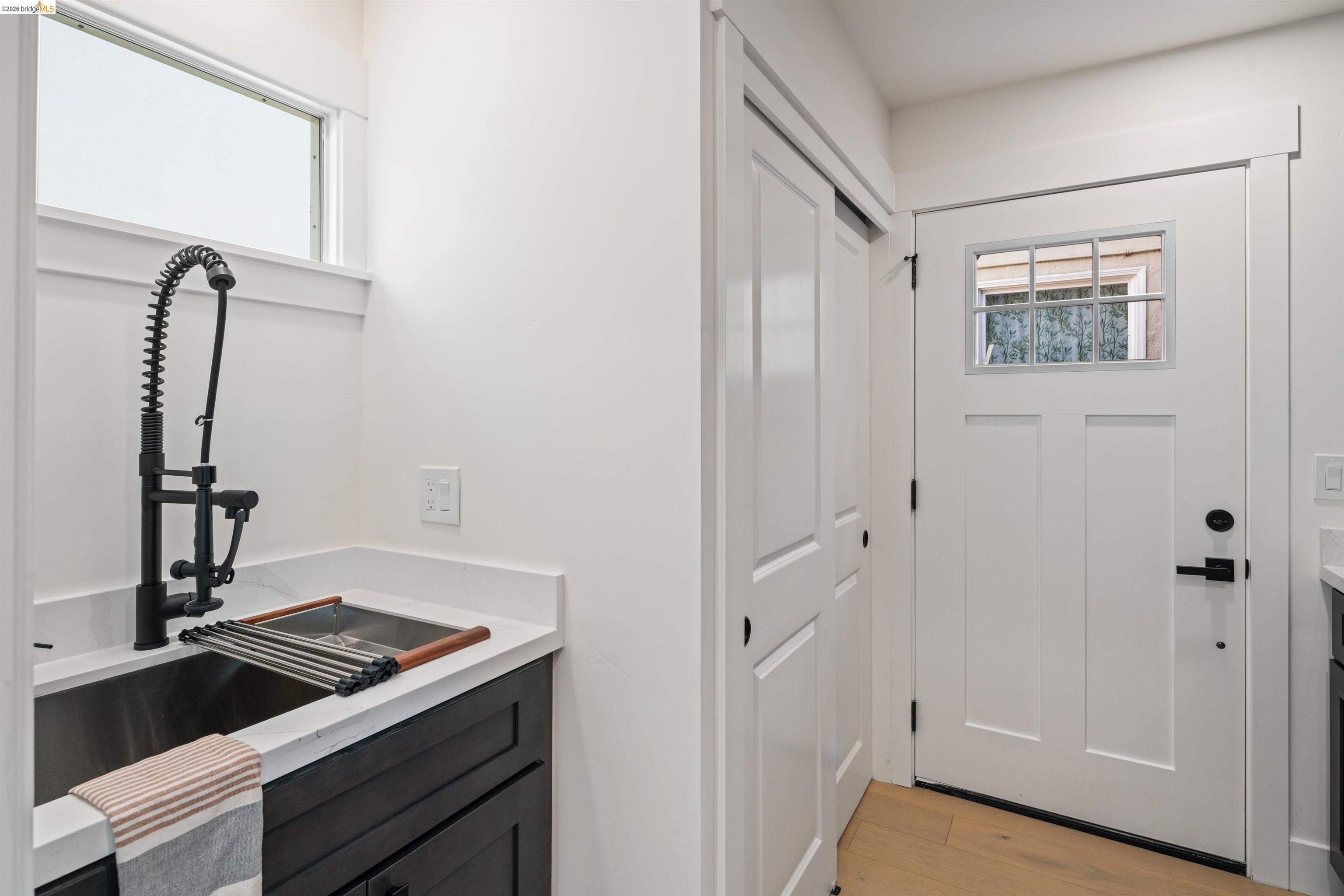 846 Adams Street Albany, CA 94706 - Photo 32 of 46 a view of an entryway with wooden floor