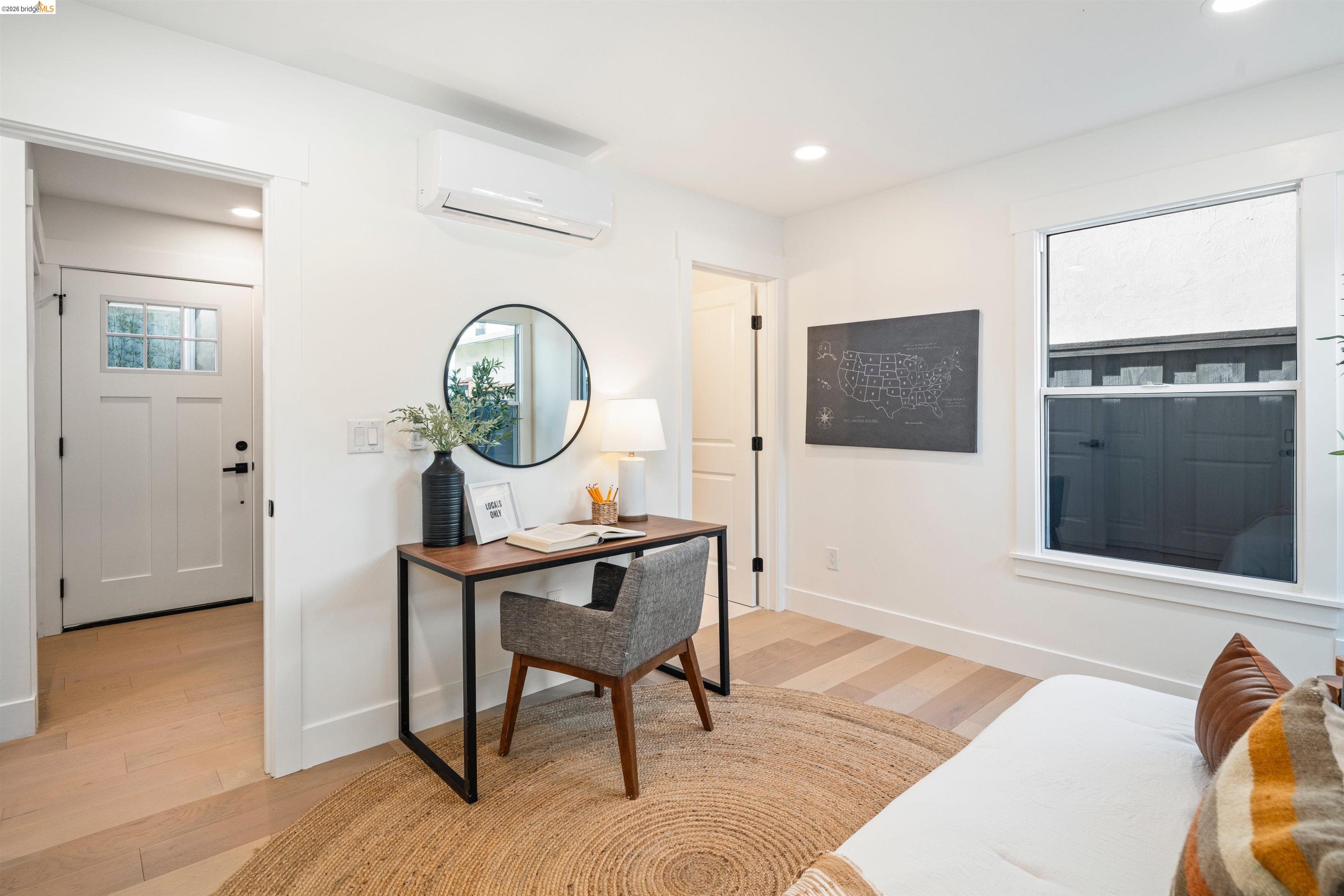 846 Adams Street Albany, CA 94706 - Photo 41 of 46 a living room with furniture and a flat screen tv