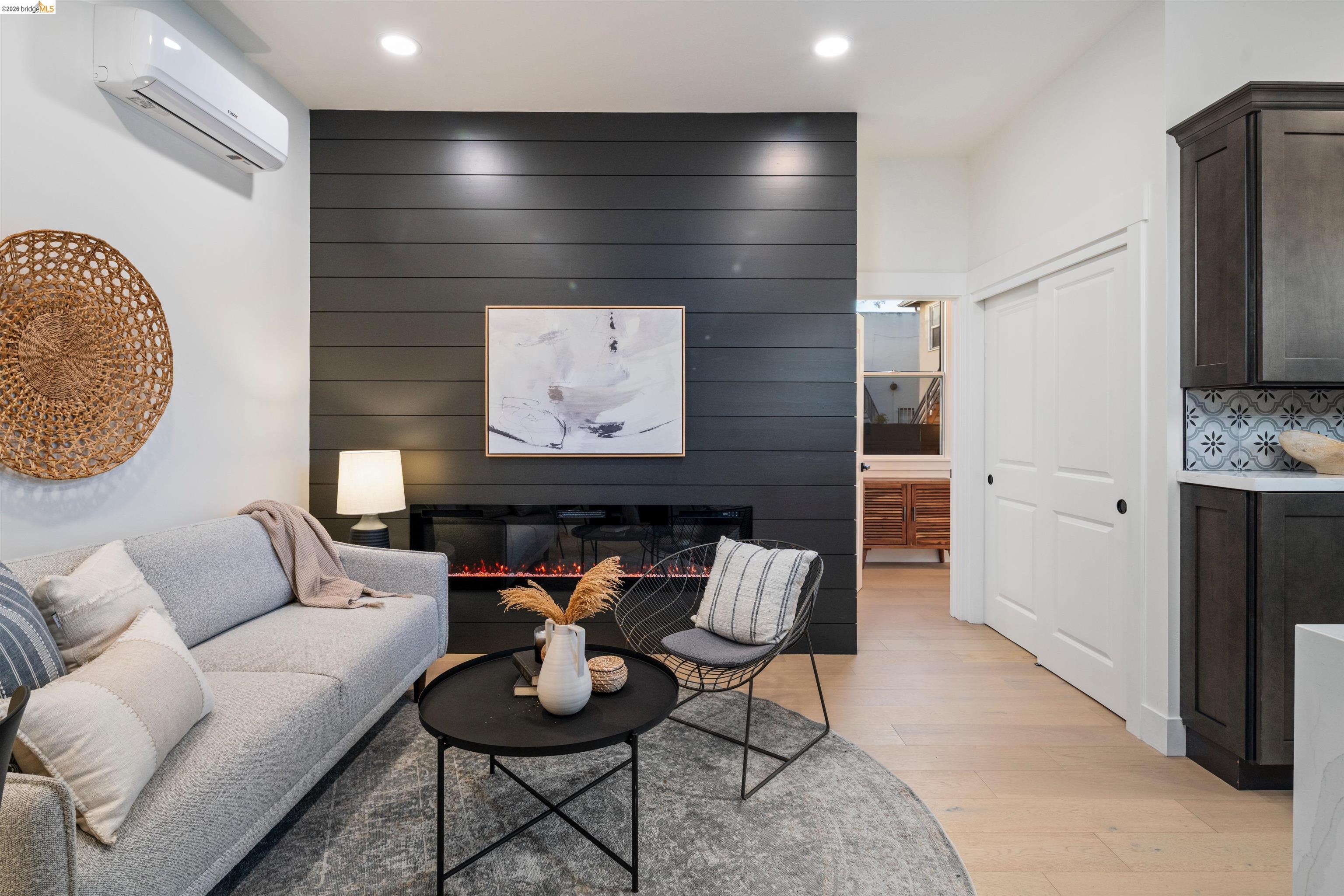 846 Adams Street Albany, CA 94706 - Photo 5 of 46 a living room with furniture and a flat screen tv