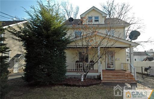 340 Bound Brook Road Middlesex, NJ 08846 - Photo 1 of 22 a front view of a house with a garden