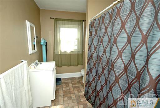 340 Bound Brook Road Middlesex, NJ 08846 - Photo 11 of 22 a bathroom with a bathtub and shower