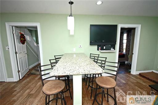 340 Bound Brook Road Middlesex, NJ 08846 - Photo 15 of 22 a living room with furniture and a flat screen tv