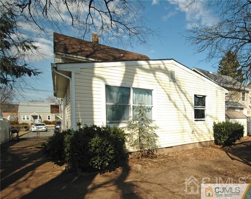 340 Bound Brook Road Middlesex, NJ 08846 - Photo 2 of 22 a view of a house with a yard