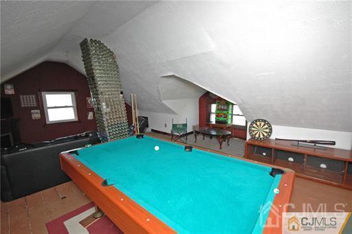 340 Bound Brook Road Middlesex, NJ 08846 - Photo 9 of 22 a room with pool table table soccer and windows