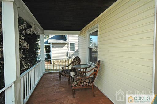 340 Bound Brook Road Middlesex, NJ 08846 - Photo 10 of 22 a view of a patio with chairs and table in a patio