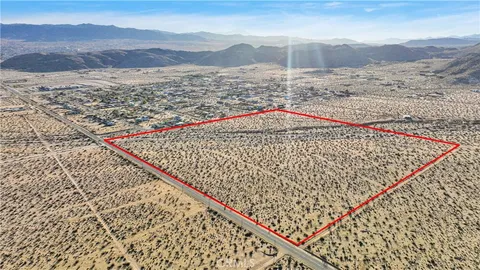 an aerial view of beach and ocean
