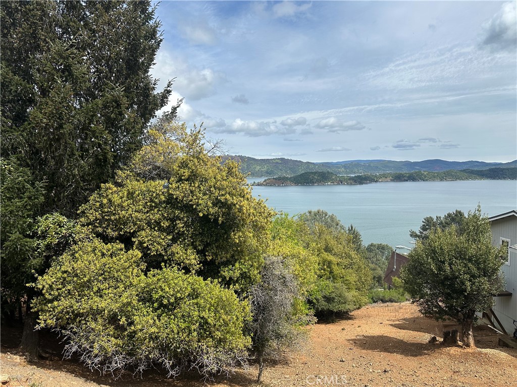 3340 Chaparral Lane Kelseyville, CA 95451 - Photo 1 of 12 a view of a lake with houses in the back