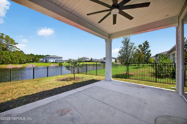 a view of house with yard outdoor seating and entertaining space