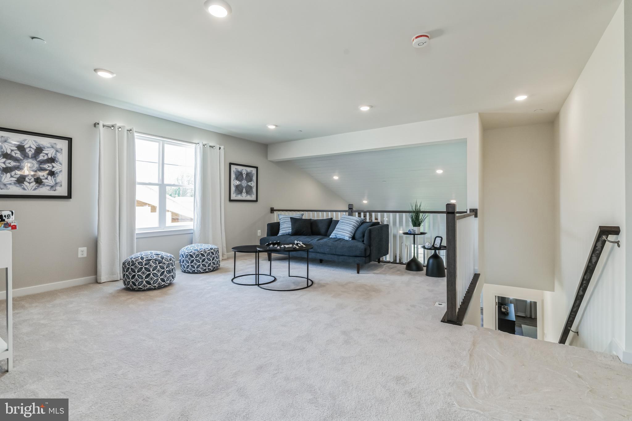 3636 Dexter Court, Unit HARPER142 Aberdeen, MD 21001 - Photo 26 of 40 a living room with furniture and a window