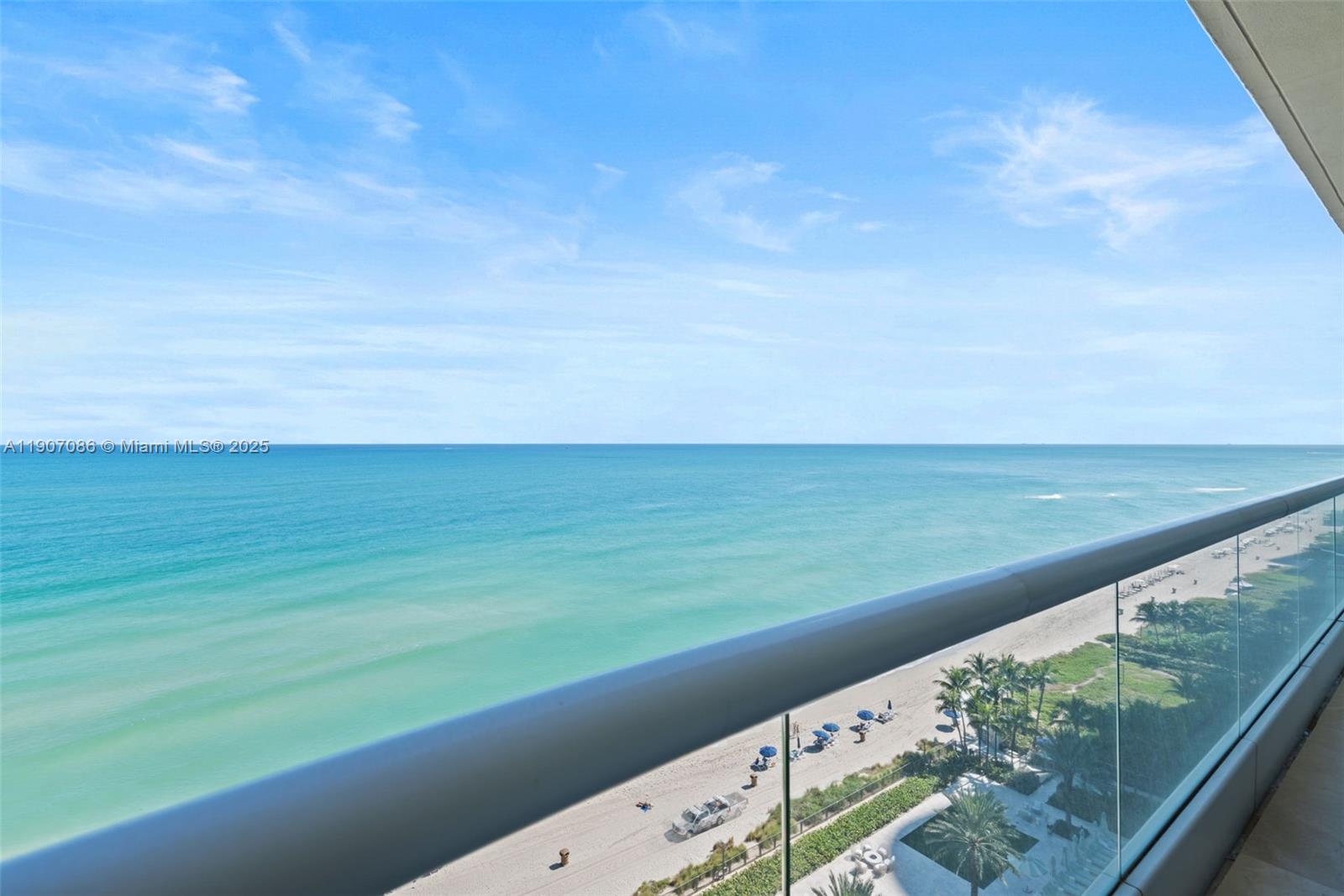 16051 Collins Avenue, Unit 1202 Sunny Isles Beach, FL 33160 - Photo 18 of 32 a view of an ocean from a balcony