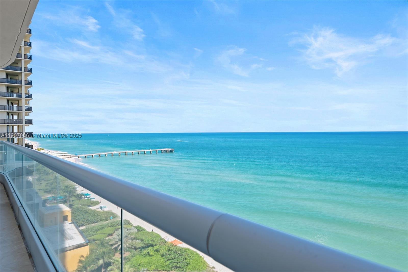 16051 Collins Avenue, Unit 1202 Sunny Isles Beach, FL 33160 - Photo 19 of 32 a view of an ocean and beach