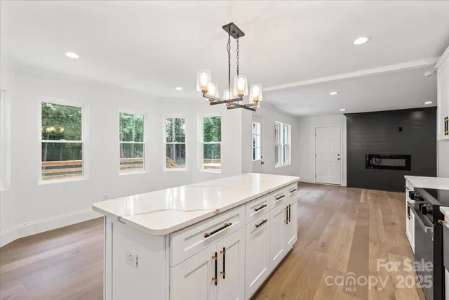 a very nice looking dining room with a large window