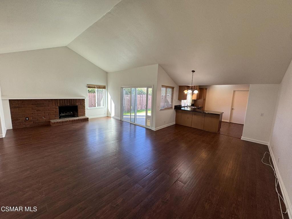 2263 Workman Avenue Simi Valley, CA 93063 - Photo 4 of 17 a living room with hard wood floors and a fireplace