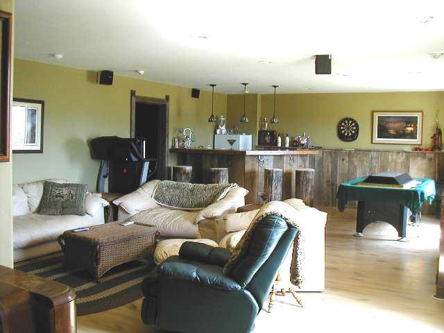 1101 227th Road Rifle, CO 81650 - Photo 6 of 7 a living room with furniture and wooden floor
