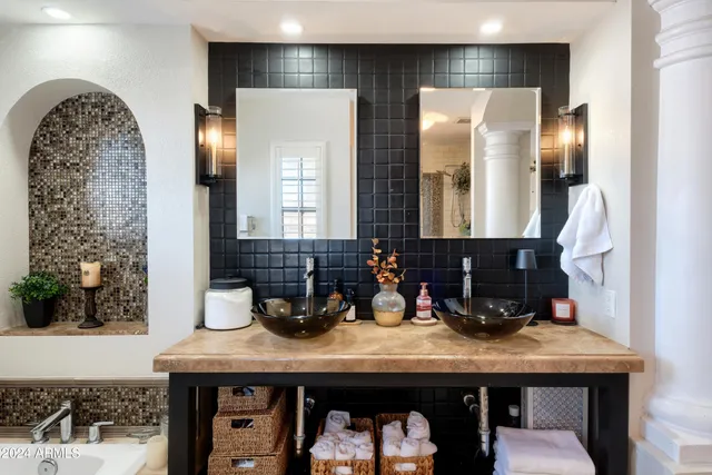 a kitchen with sink and refrigerator