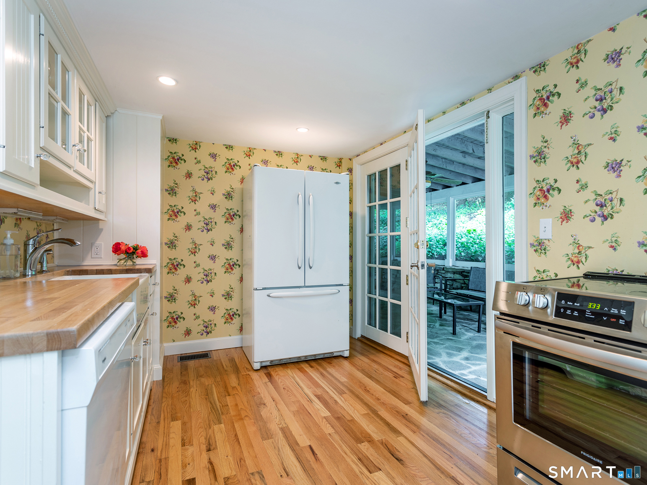 61 Curtiss Road Warren, CT 06777 - Photo 5 of 13 a kitchen with stainless steel appliances granite countertop a refrigerator and a stove top oven
