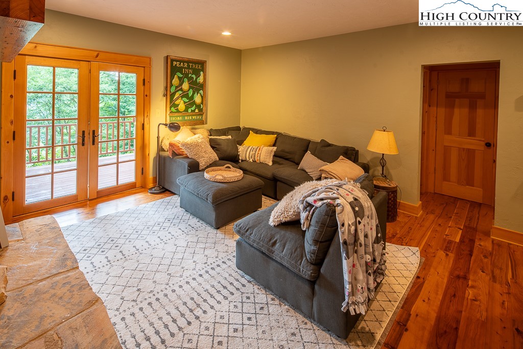 138 Mulberry Lane Boone, NC 28607 - Photo 27 of 33 a living room with furniture and a rug