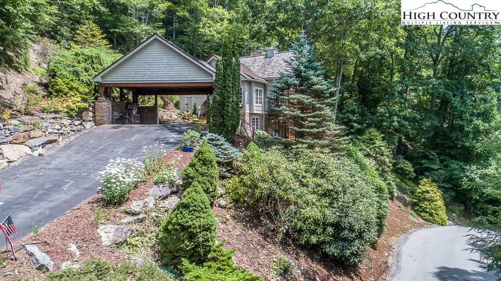 138 Mulberry Lane Boone, NC 28607 - Photo 31 of 33 a front view of a house with garden
