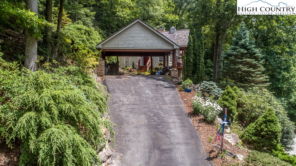 138 Mulberry Lane Boone, NC 28607 - Photo 32 of 33 a front view of a house with garden