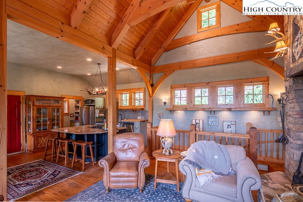 138 Mulberry Lane Boone, NC 28607 - Photo 6 of 33 a outdoor living space with patio furniture and a potted plant
