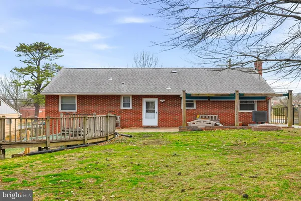 a view of a couches in backyard of house