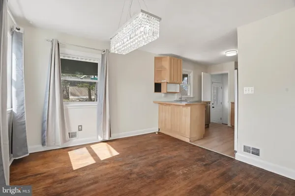 a view of a kitchen with a sink cabinets and a window
