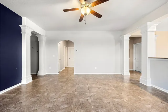 a view of an empty room and window