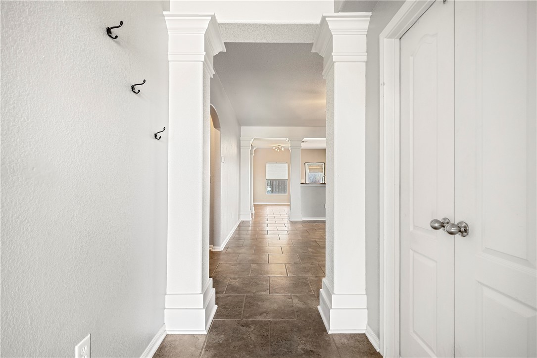 1022 Imperial Street Portland, TX 78374 - Photo 8 of 16 a view of a hallway with wooden floor