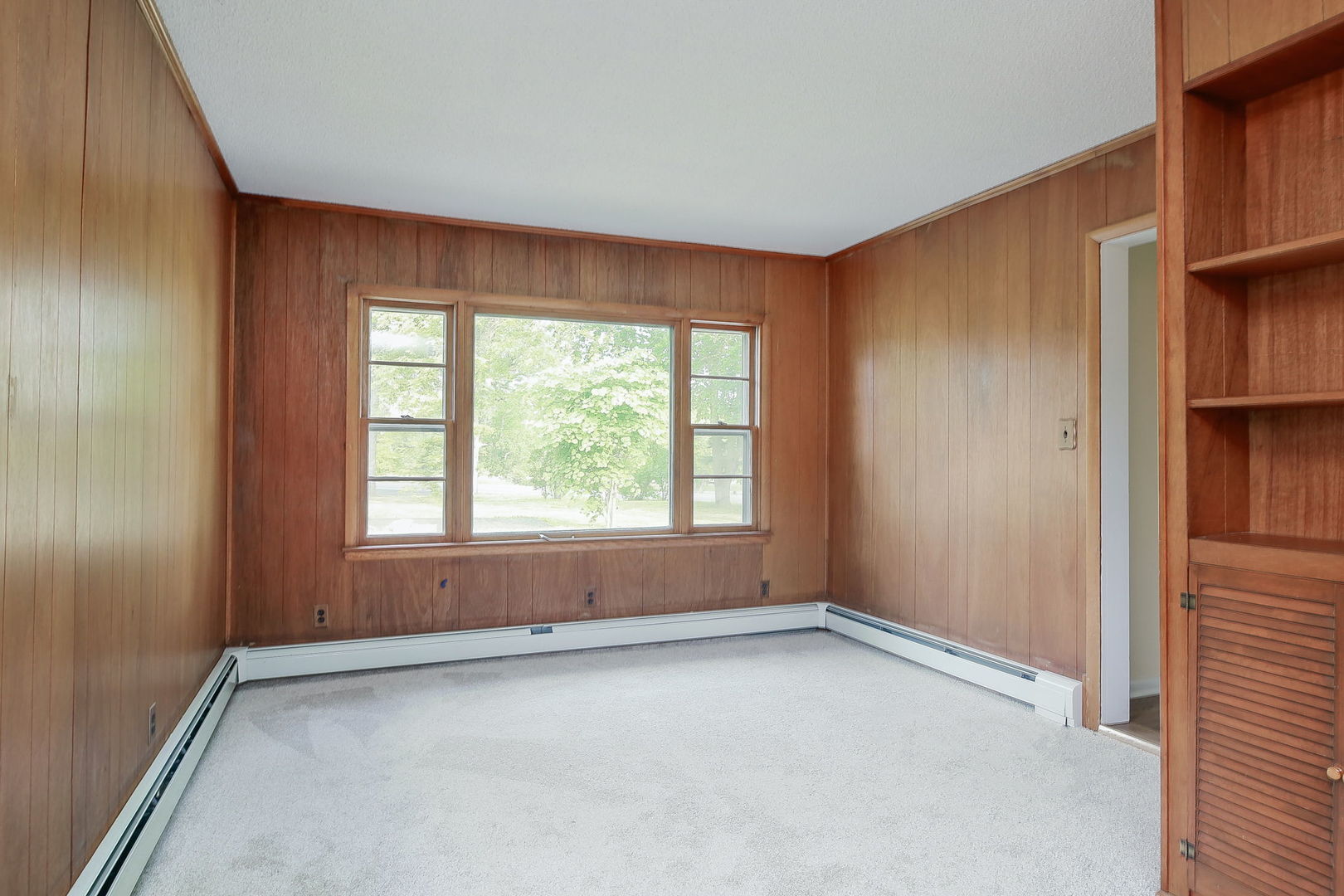 1170 South Broadway Road Montgomery, IL 60538 - Photo 14 of 25 an empty room with windows