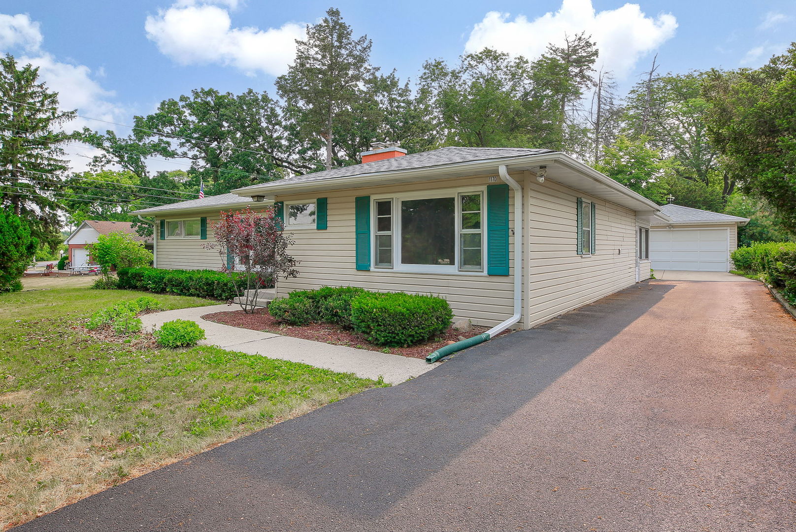 1170 South Broadway Road Montgomery, IL 60538 - Photo 2 of 25 a view of a house with yard and plants