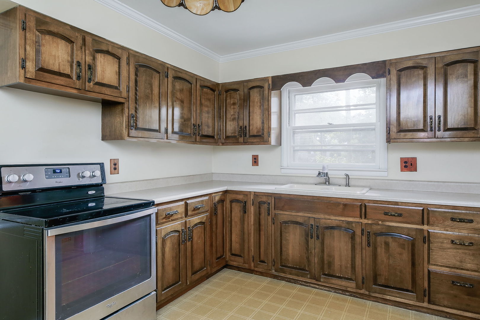 1170 South Broadway Road Montgomery, IL 60538 - Photo 8 of 25 a kitchen with stainless steel appliances granite countertop a sink and cabinets