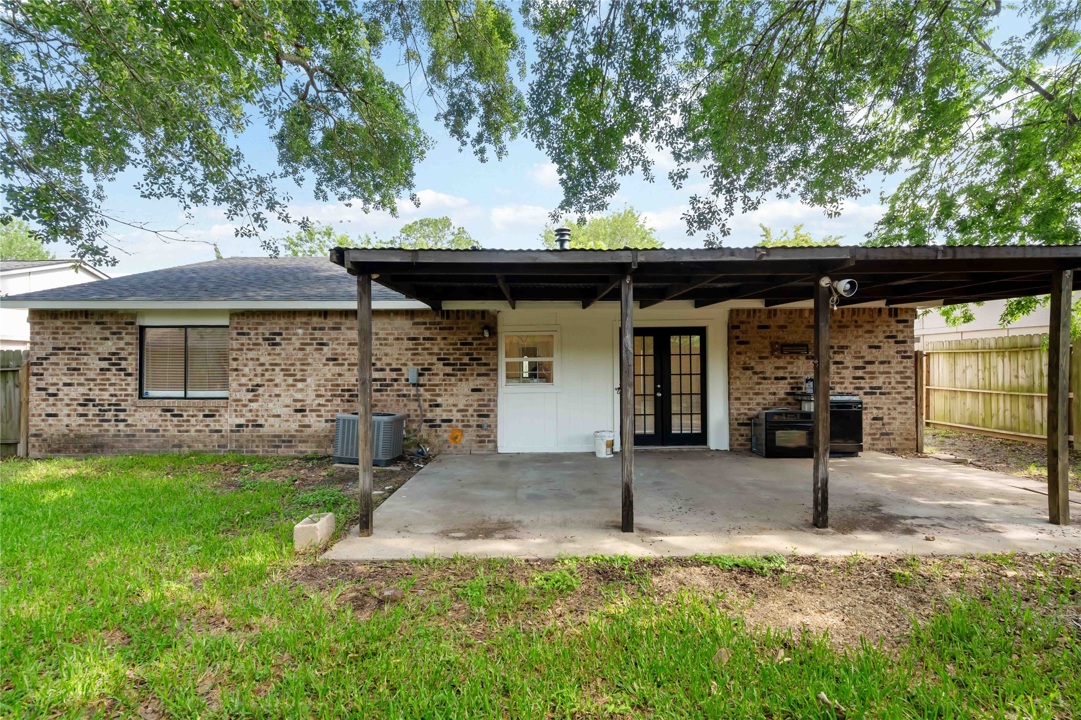 17415 North Barker Street Houston, TX 77084 - Photo 30 of 30 a front view of a house with garden