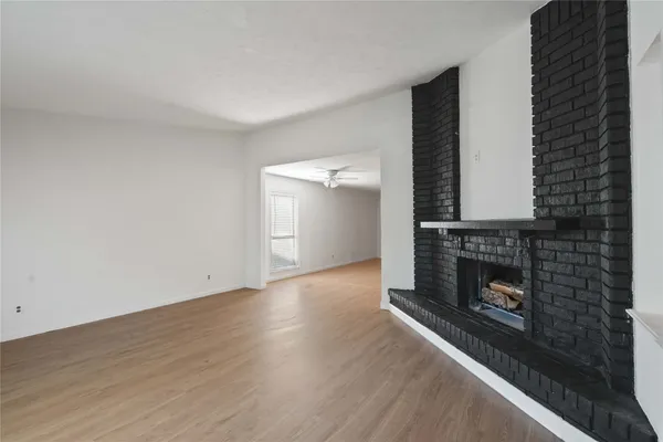 a living room with a fireplace