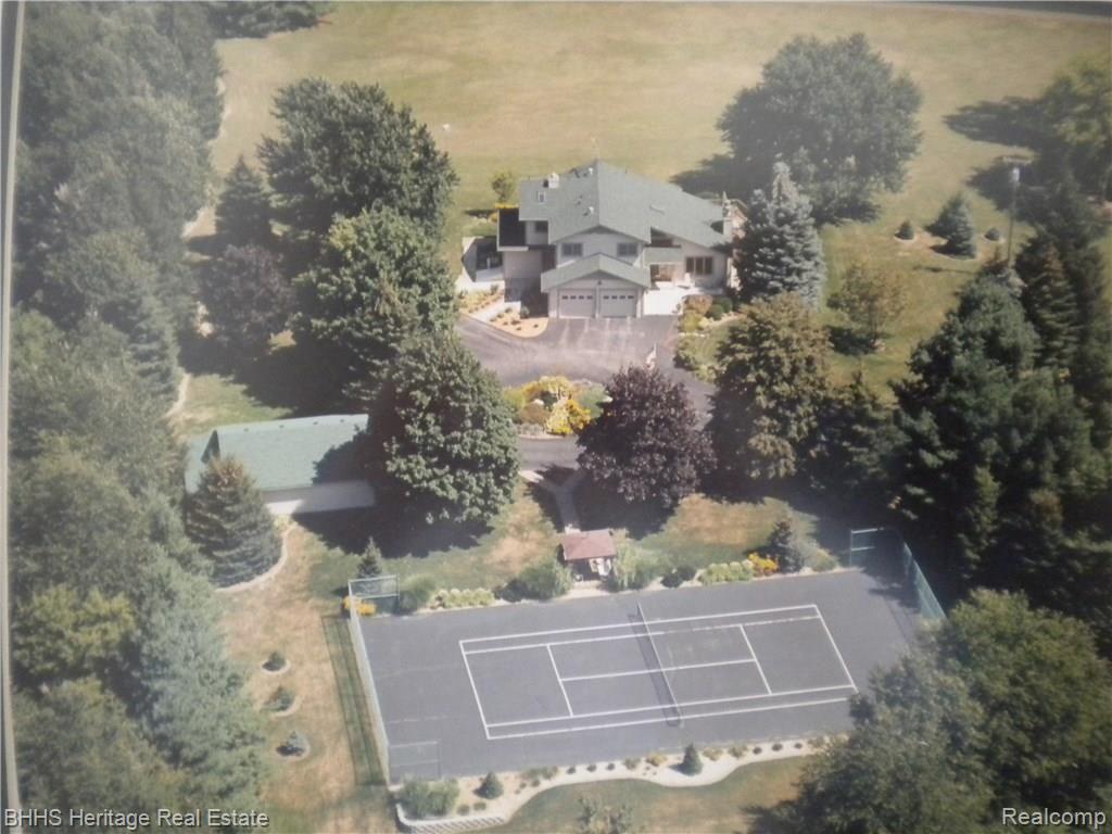 5543 King Road Howell, MI 48843 - Photo 1 of 30 Aerial view of property, pole barn and tennis court