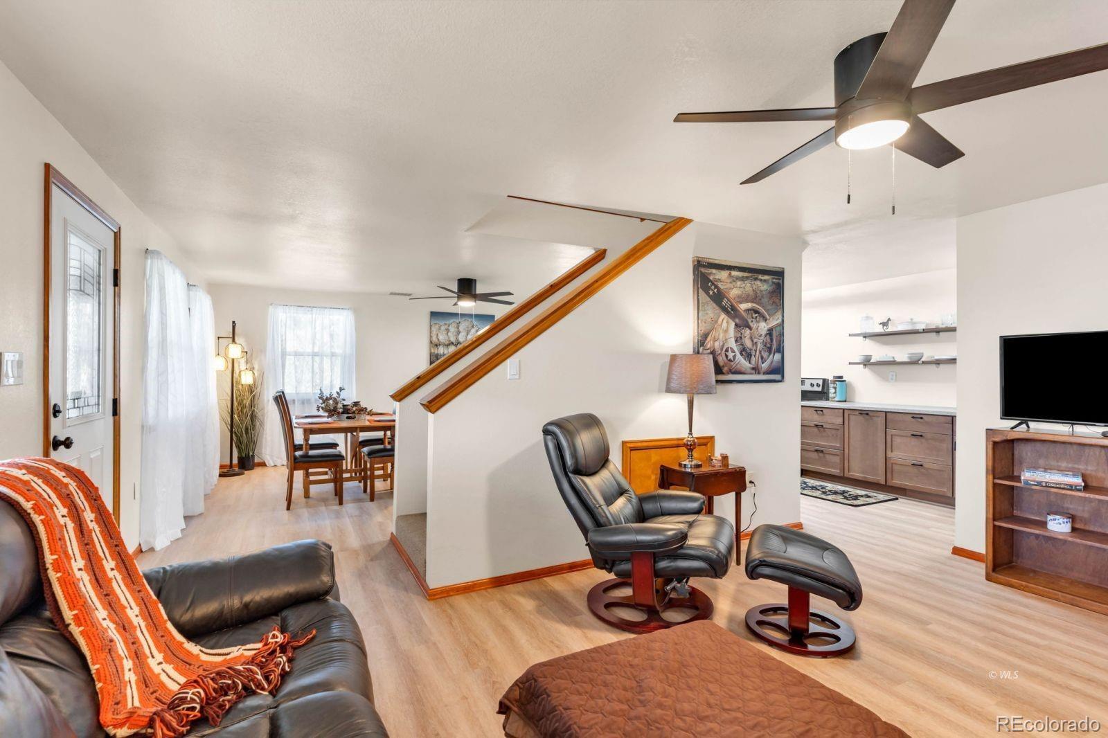 570 Rocky Ridge Road Westcliffe, CO 81252 - Photo 13 of 33 a view of a livingroom with workspace and a window