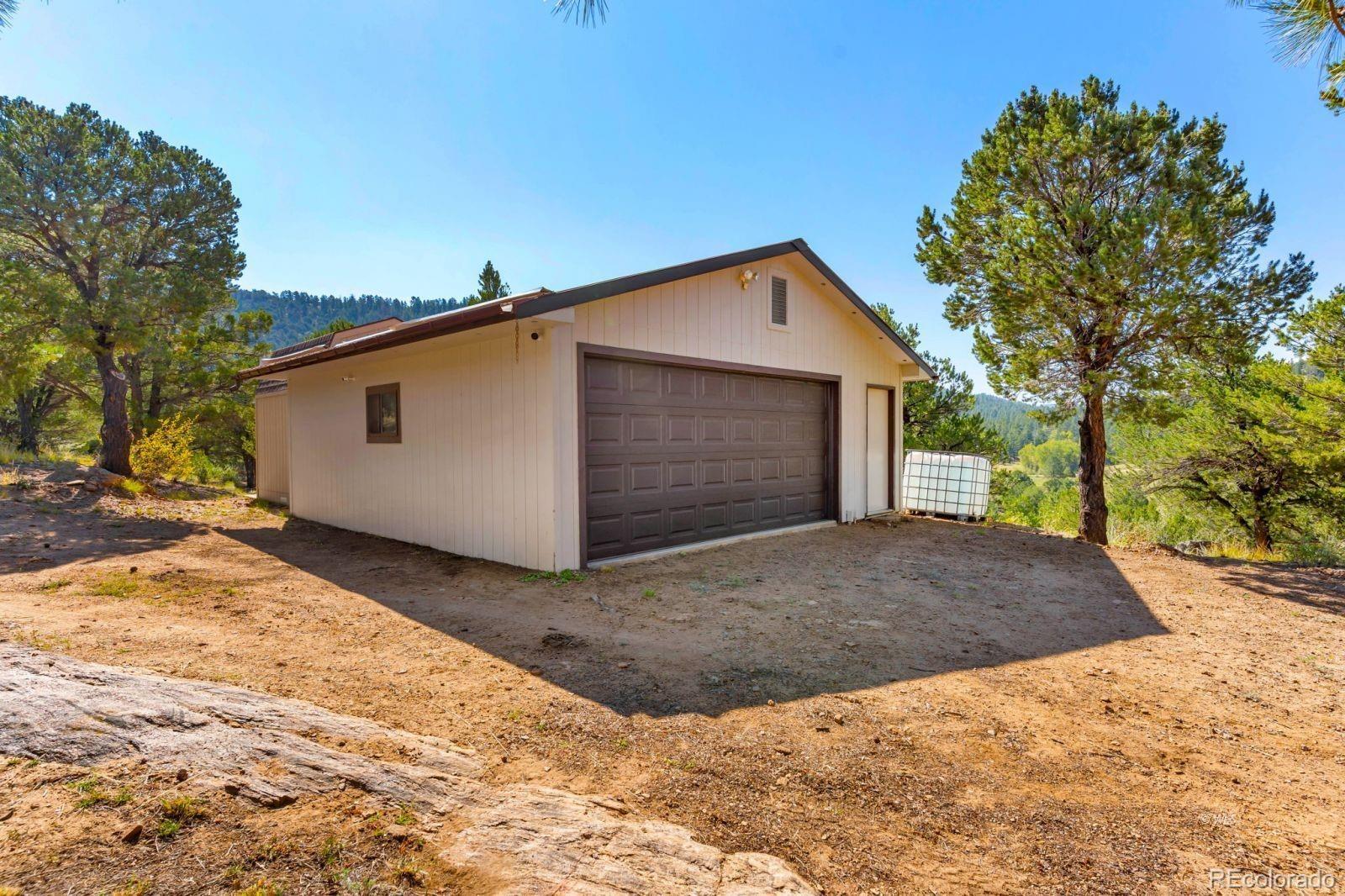 570 Rocky Ridge Road Westcliffe, CO 81252 - Photo 27 of 33 a view of backyard of house