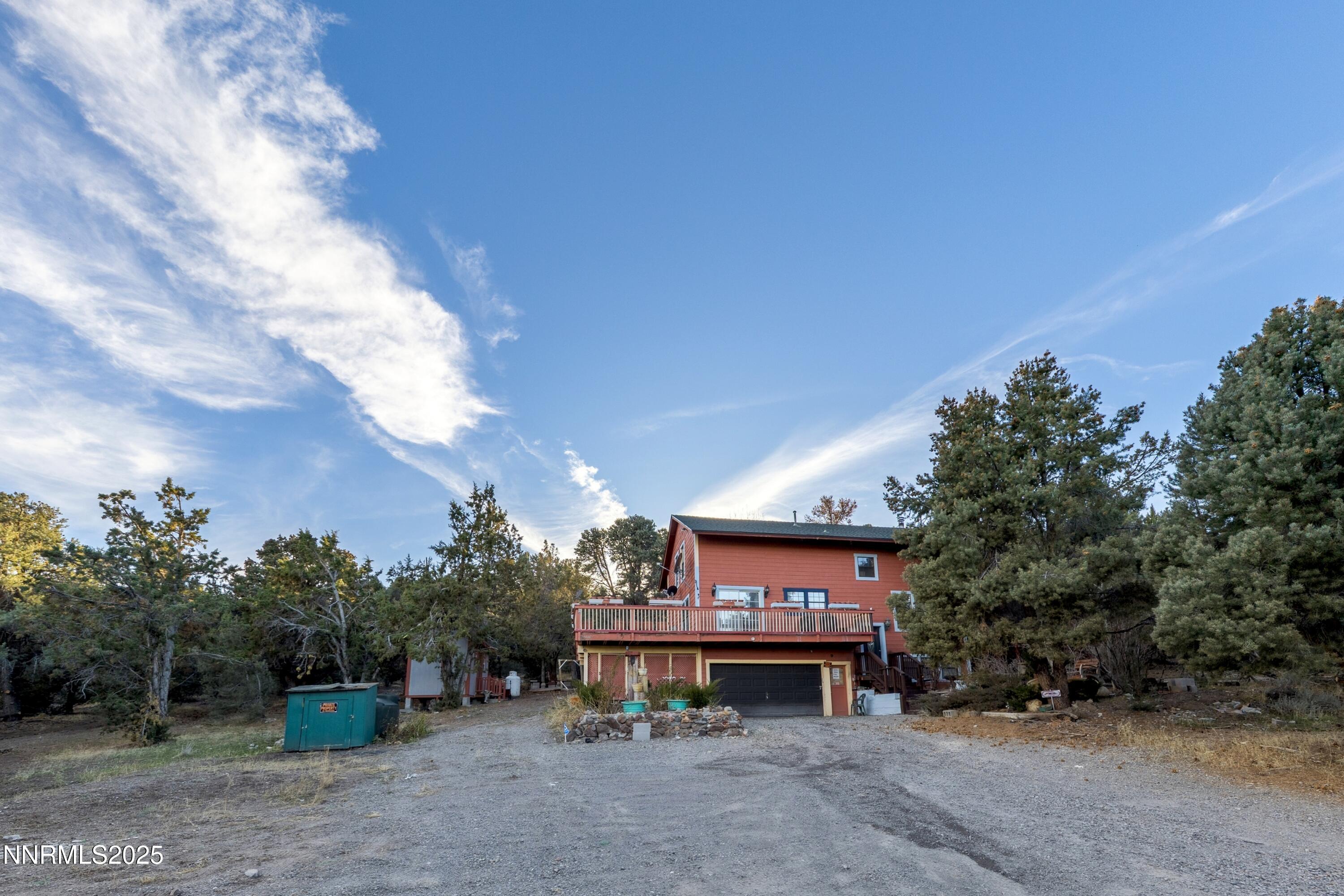 21565 Dortort Drive Reno, NV 89521 - Photo 1 of 25 a table and a building in the background
