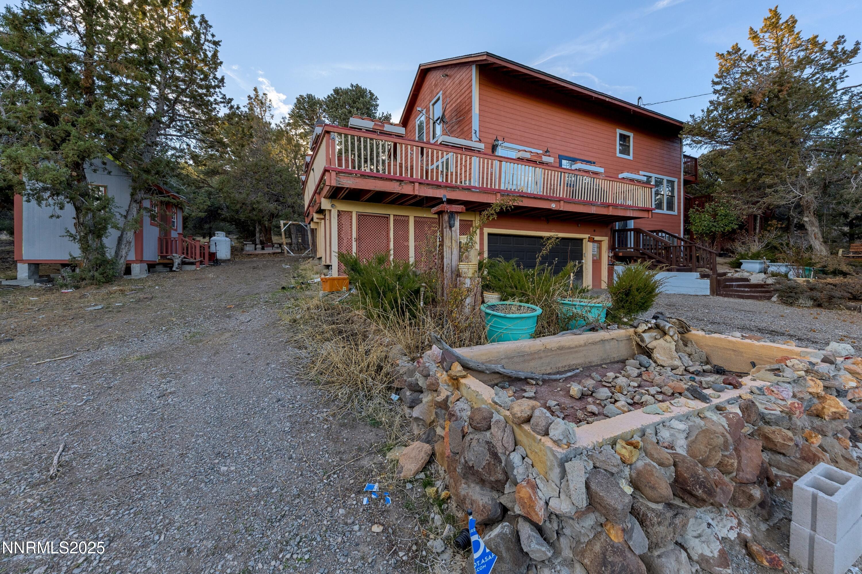 21565 Dortort Drive Reno, NV 89521 - Photo 24 of 25 a front view of a house with garden